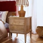 Claudine Bedside Table with carved details, soft-close drawers, and metal knobs