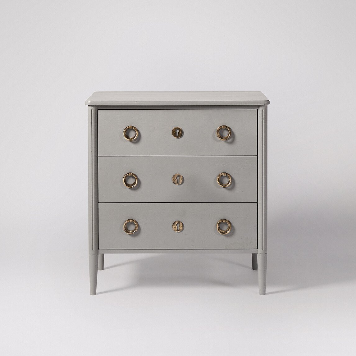 Reyna Three-Drawer Chest of Drawers in mango wood with brass handles and minimalist Scandinavian design