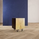 Ziggy Bedside Table with zig-zag drawer front design and tapered legs
