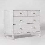 Verne Four-Drawer Chest of Drawers in mango wood with brass handles and a plinth base