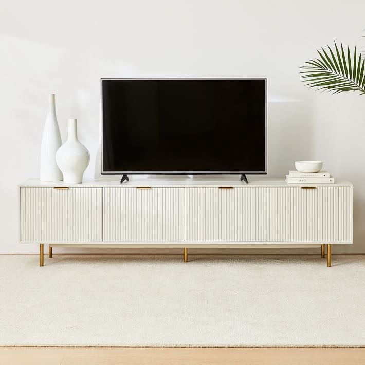 Fluted Console Table with grooved panel detailing and a sleek modern design