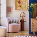 Ritz Occasional Chair with velvet upholstery, gold-finished legs, and a curved silhouette