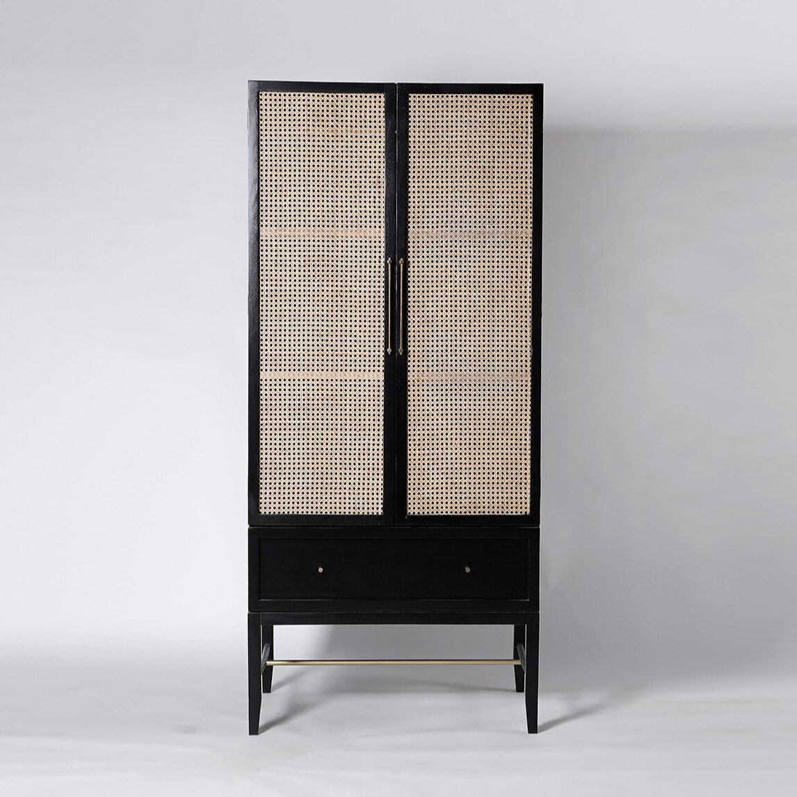 Raphia Double Wardrobe – Natural Rattan & Solid Wood Raphia Double Wardrobe – Solid wood wardrobe with natural rattan panels and brass handles