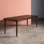 Hove Eight-Seater Dining Table in natural oak-stained mango wood with brass-accented tapered legs