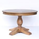 Gileteen Round Dining Table with sleek wood finish and modern design