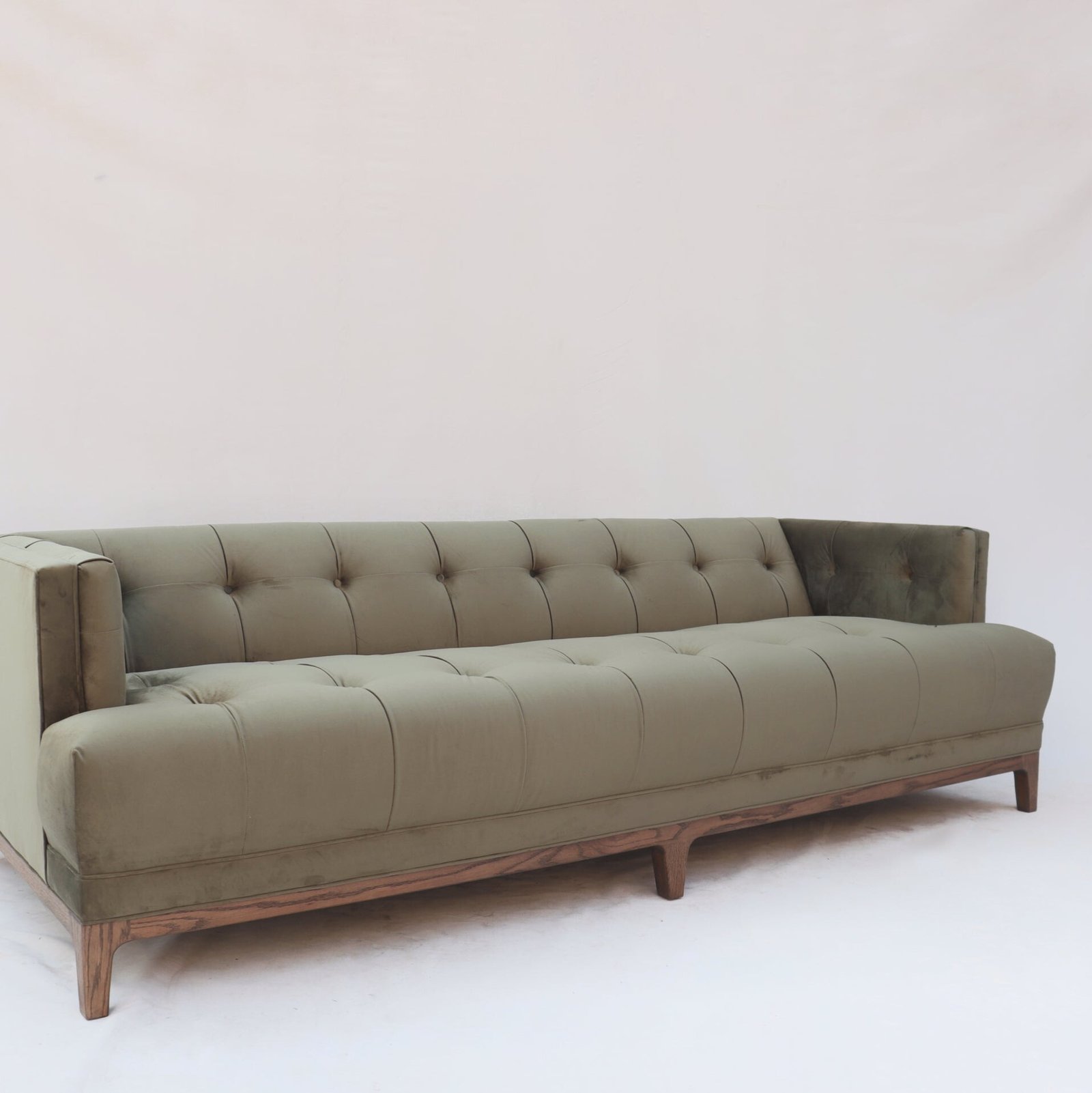 Gileteen Tufted Tuxedo Sofa with deep tufting and high arms.