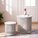 Artisan's Handcarved Small End Table made from solid wood with intricate detailing and a white finish