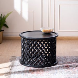 Artisan's Brew Handcarved Coffee Table made from solid wood with intricate detailing and a rustic black finish