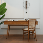 Gileteen Study Desk made from solid wood with a sleek finish and built-in storage compartments