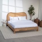 Gileteen Rattan Mango Wood Bed with a natural mango wood frame and woven rattan headboard