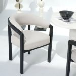 Gileteen Dining Chair – Solid wood frame with cushioned seat and curved backrest.