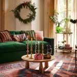 Cole Coffee Table in natural oak-stained mango wood with curved timber legs