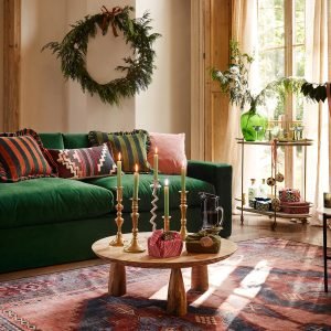 Cole Coffee Table in natural oak-stained mango wood with curved timber legs