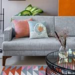 Marina Sofa with wooden frame and soft beige cushions in a coastal living room