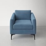 Pearl Upholstered Armchair with curved back and neutral fabric finish