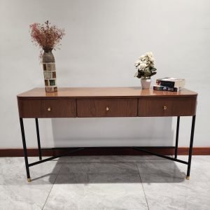 "Nomad solid wood console table with natural finish and clean lines"