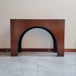 "Archway Console Table with arched wooden base and smooth natural finish"