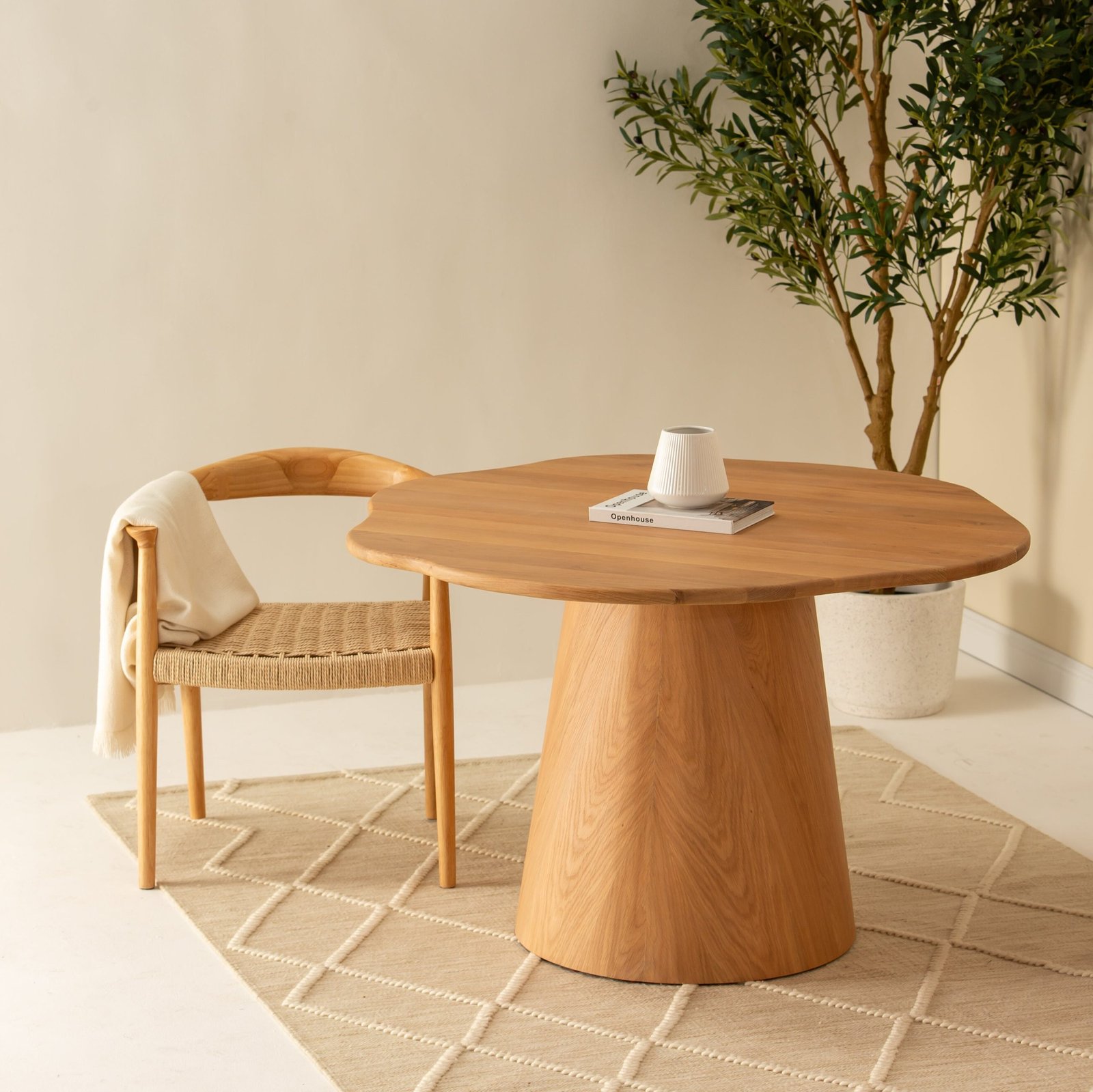 Vinci Solid Oak Dining Table featuring a sleek design and natural wood grain finish