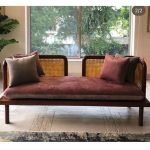 Maison cane sofa with solid wood frame, natural cane panels, and cushioned seat