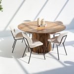 Kinley Round Wood Dining Table with a smooth wooden top and classic pedestal base in natural finish