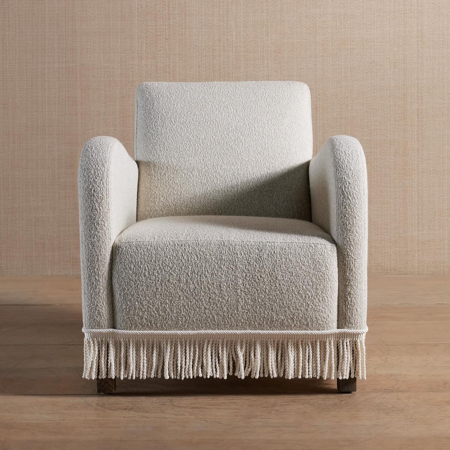 Parisian Fringe Bouclé Armchair in ivory fabric with curved back and fringe trim