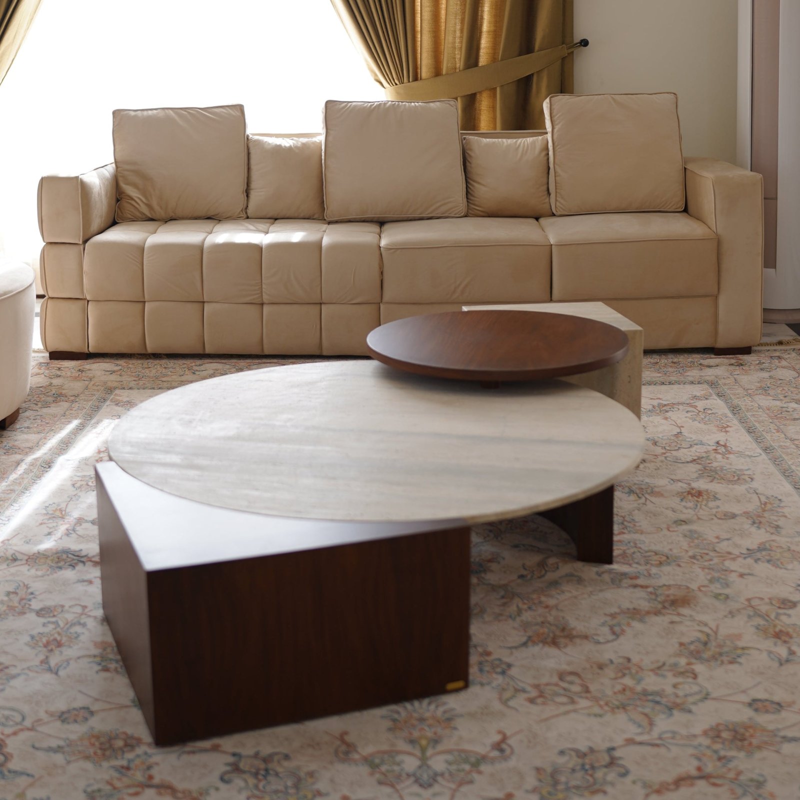 Modern Tokyo Sofa with low backrest and neutral fabric in a minimalist living room