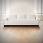 White Symphony Sofa – modern curved white couch with plush upholstery