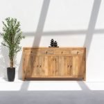 Ziyah Wooden Slat Door Sideboard with sleek wooden slats and a natural finish.