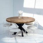 Round Mango Wood Dining Table with natural grain and solid pedestal base