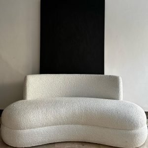 Cream Curved Sherpa Sofa – plush cream-colored bouclé couch with sculptural curved silhouette