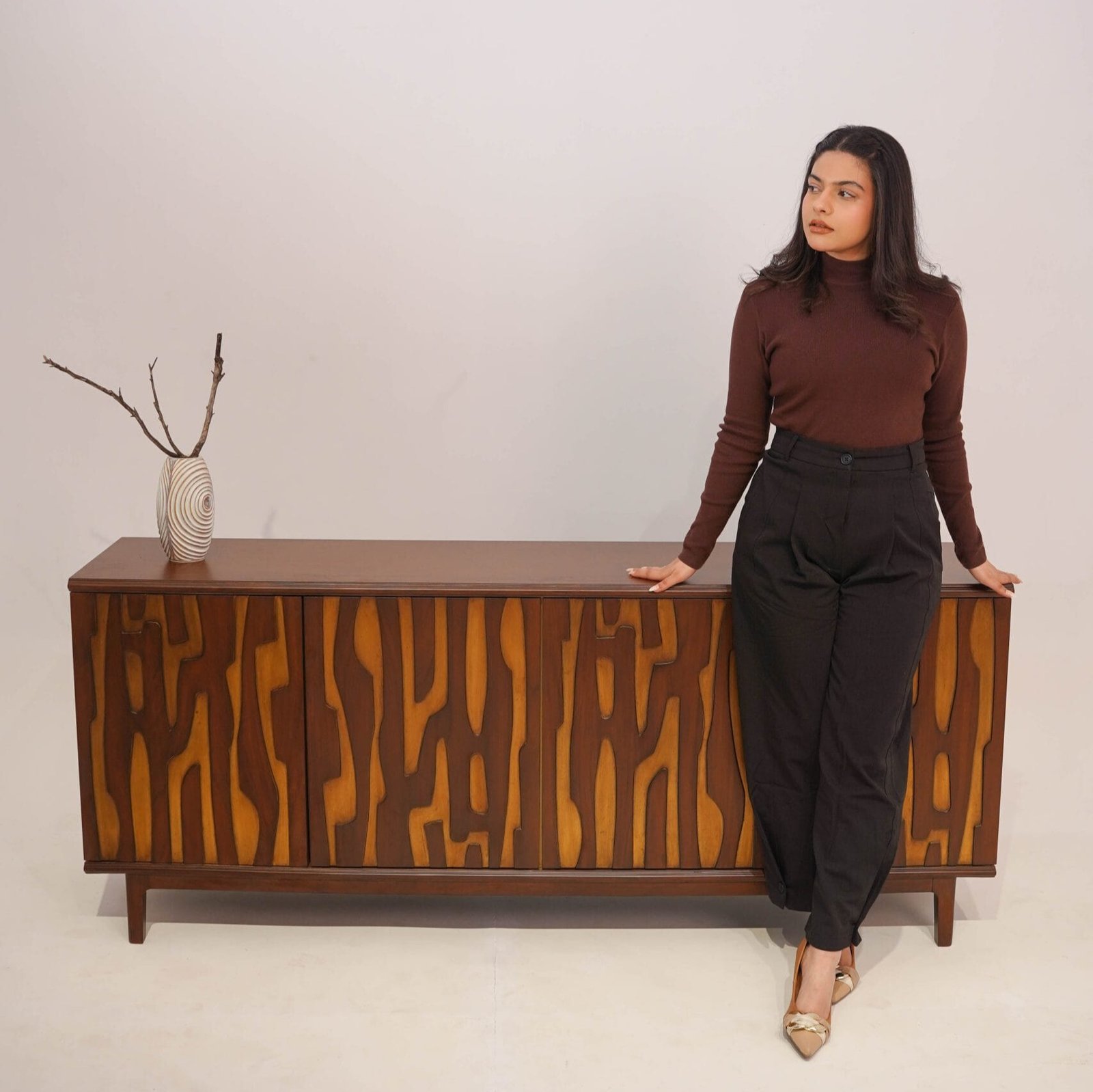 Ajanta Sideboard with hand-carved wooden patterns and solid wood frame in natural finish