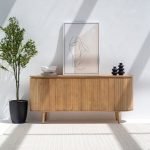 Kate Column Sideboard in natural wood finish with vertically grooved doors and spacious storage compartments.