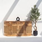 Ismérie Wooden Sideboard featuring a solid wood frame, spacious storage compartments, and a minimalist modern design.