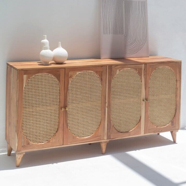 Naevia Rattan Doors Acacia Wood Sideboard with handwoven rattan detailing and a solid wood frame, featuring four storage compartments.