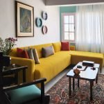 Kaanch Sofa 7 Seater – modern luxury sofa with plush velvet and sculptural base for large living spaces