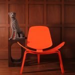 Shell Chair with sculpted wooden frame and organic curved seat design