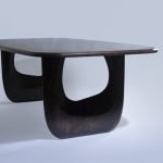 Royal Reserve 8-seater solid wood dining table with ornate legs and polished finish in a grand dining room