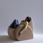 Cocoon Elegance Chair with curved design and plush upholstery for modern interiors