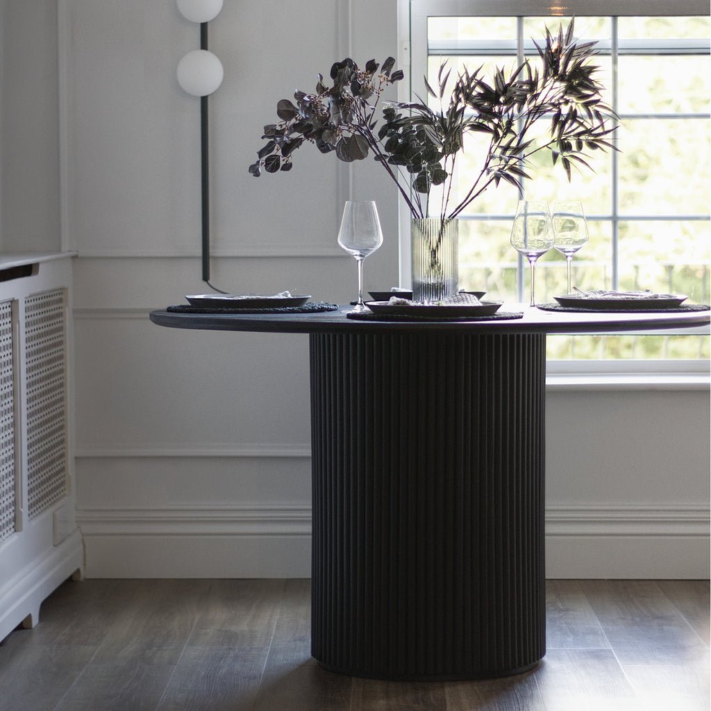 Baldr Black Dining Table in solid wood with minimalist design and matte finish