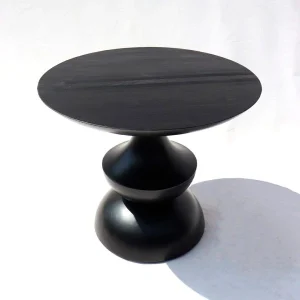 Bole Table with natural wood grain and irregular organic shape in a rustic living room