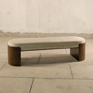 Royce Bench with upholstered seat and sleek wooden legs in a modern interior