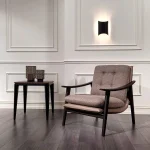 Elan Luxeb Arm Chair with soft boucle fabric and sleek metal legs in a minimalist living room