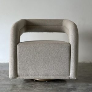 Curvy-Wrap Round Sofa Chair with plush upholstery and modern sculptural design