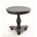 Black round low side table with solid mahogany construction and washed ebony finish​
