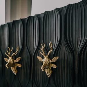 The Sahara Stag Cabinet – solid wood cabinet with hand-painted stag motif in earthy tones