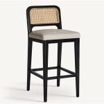 Raffles Black & Cane Bar Stool with black-stained pine frame, natural cane backrest, and oatmeal linen upholstered seat