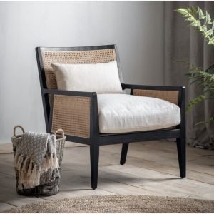 Raffles Cane and Black Armchair with black ash frame, natural rattan panels, and upholstered cushions