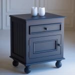 Seaside Bedside Table showcasing solid mango wood construction with bun feet and framed drawers.