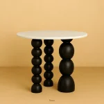 Ball Pack Round Coffee Table – modern handcrafted table with circular top and sculptural ball-style base, made from solid wood or resin.