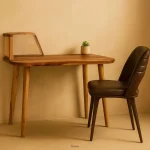 CaneCraft Study Table – solid wood study table with handwoven cane drawer fronts, minimal design, and warm natural finish.